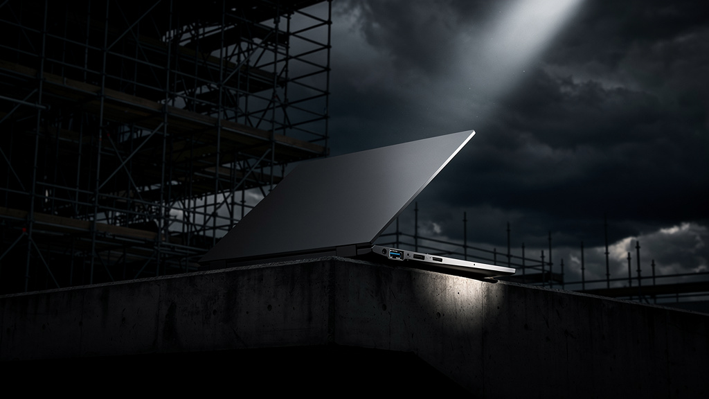Featured image for Framework laptop to get royalty-free Oculink port. Style: dark_moody.